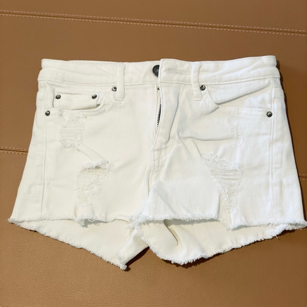 Woman White Distressed Jean Shorts. Size 23 W.